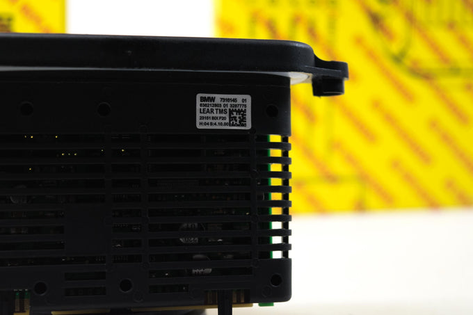 OE Replacement: Headlight Control Module <br>10-15 BMW M135I