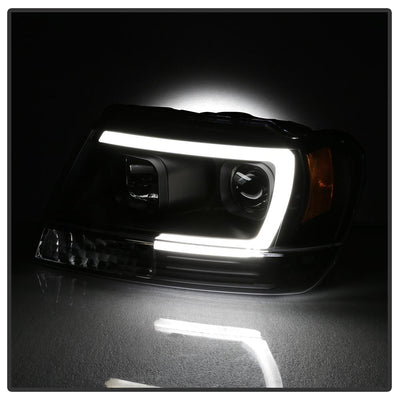 Version 2 Black Light Bar Projector Headlights <br>99-04 Jeep Grand Cherokee
