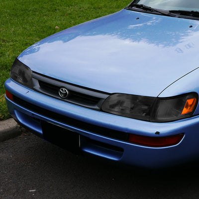 D-Motoring - Headlights - Smoked Housing - Smoked Lens - Amber Corner - Plug-n-Play - Pair - 93-97 Toyota Corolla - 7