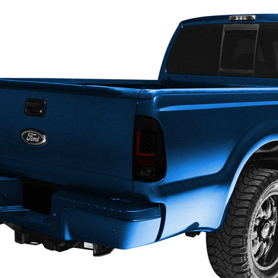 D-Motoring - Tail lights - Red LED L-Bar - Black Housing - Smoked Lens - Plug-n-Play - Pair - Ford F-150 / F-150 Heritage / F-250 SD / F350 SD / F-450 SD / F-550 SD - 7
