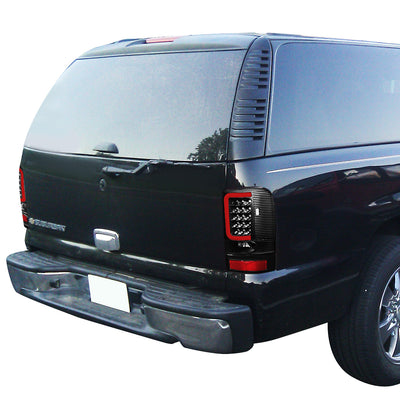D-Motoring - Tail lights - 3D LED Red Bar - Black Housing - Clear Lens - Plug-n-Play - Pair - GMC Yukon / Chevrolet Tahoe / Suburban - 7